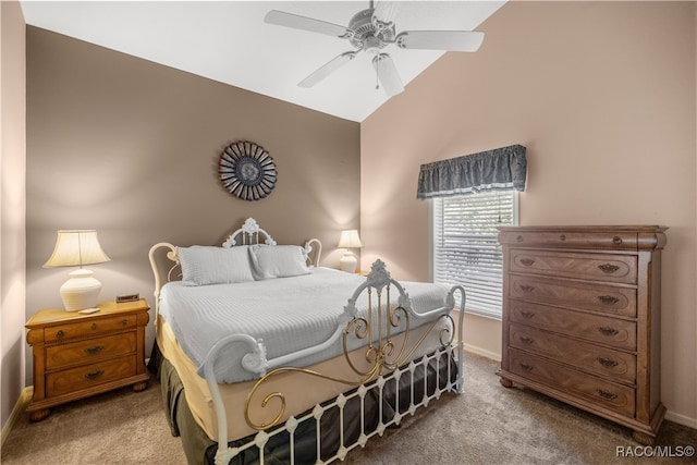 bedroom with carpet flooring, vaulted ceiling, and ceiling fan