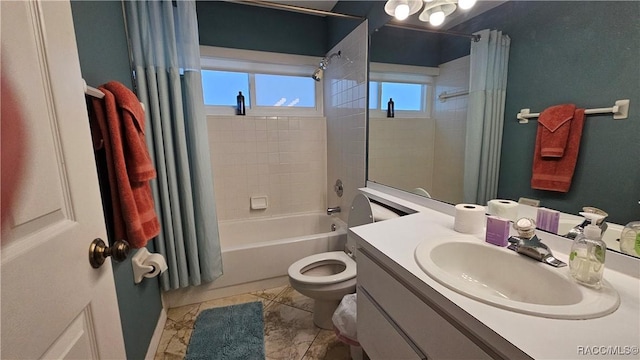 full bathroom with shower / tub combo, vanity, and toilet