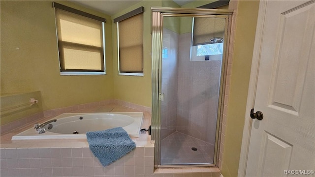 bathroom with independent shower and bath