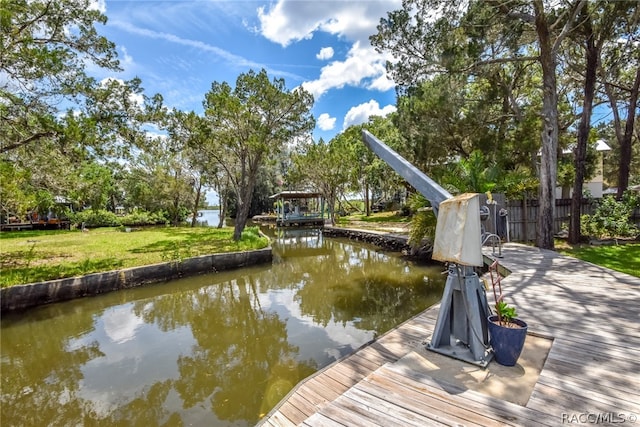 view of dock featuring a water view