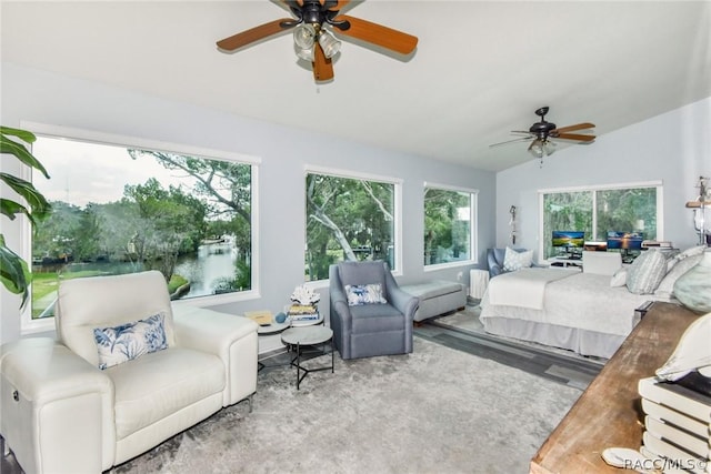 2247 S Waterman Dr, Crystal River, FL 34429 - bedroom with vaulted ceiling, wood finished floors, and a ceiling fan