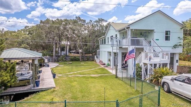 2247 S Waterman Dr, Crystal River, FL 34429 - view of property exterior featuring stairs, a gazebo, and a gate