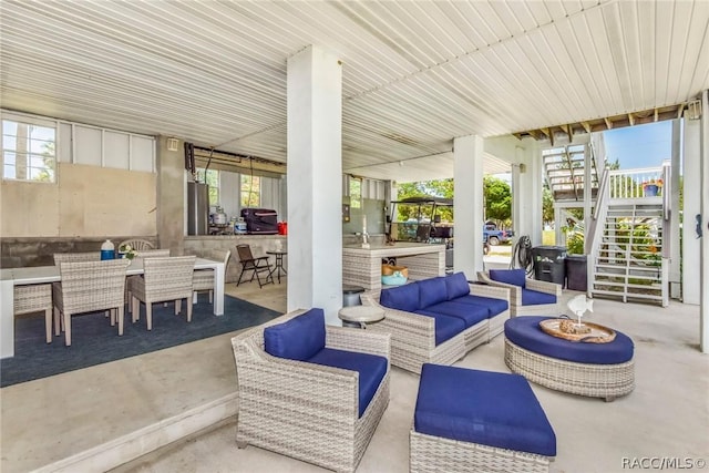 2247 S Waterman Dr, Crystal River, FL 34429 - view of patio featuring an outdoor living space, stairs, and outdoor dining space