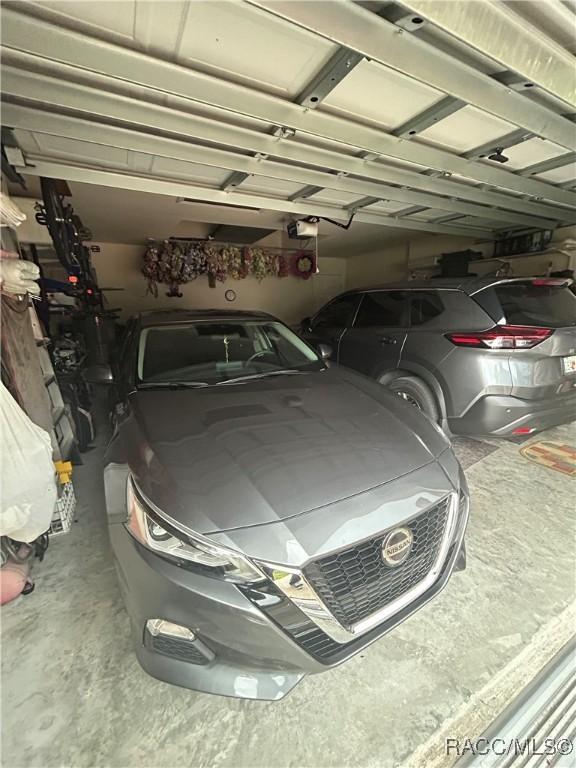 3495 W Wilburton Dr, Citrus Springs, FL 34433 - garage with a garage door opener