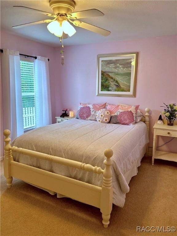 3495 W Wilburton Dr, Citrus Springs, FL 34433 - bedroom featuring carpet and a ceiling fan