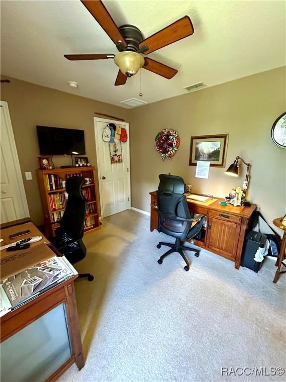 3495 W Wilburton Dr, Citrus Springs, FL 34433 - office space featuring light colored carpet and ceiling fan