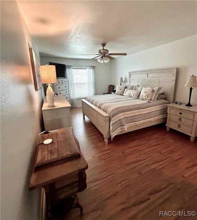 3495 W Wilburton Dr, Citrus Springs, FL 34433 - bedroom with dark wood finished floors and a ceiling fan