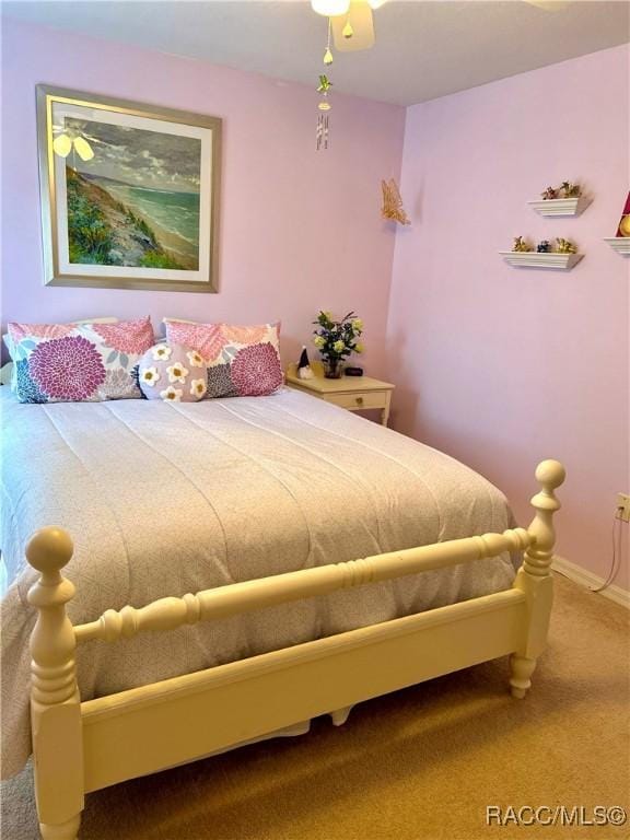 3495 W Wilburton Dr, Citrus Springs, FL 34433 - carpeted bedroom featuring ceiling fan