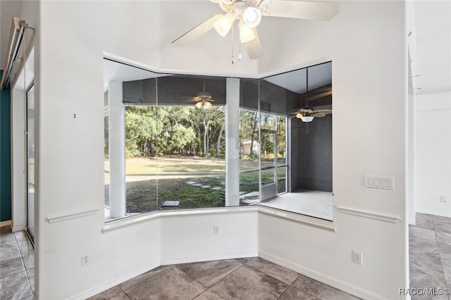 unfurnished room with tile patterned floors