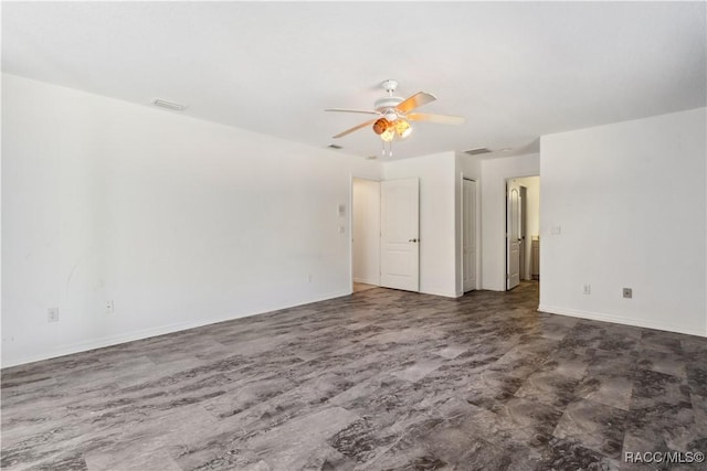 spare room with ceiling fan