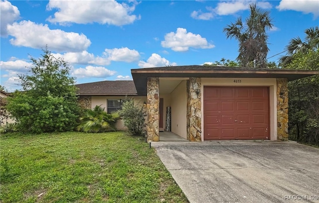 4055 N Little Hawk Pt, Crystal River, FL 34428 - view of front facade with a front lawn, stucco siding, and stone siding