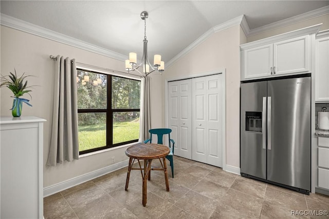 3153 N Chandler Dr, Hernando, FL 34442 - dining space with ornamental molding, a chandelier, and vaulted ceiling