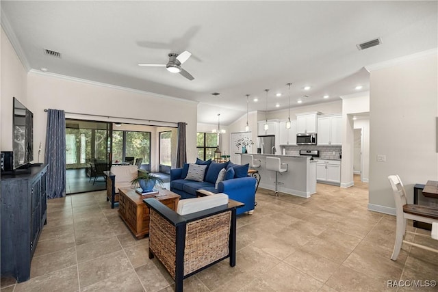 3153 N Chandler Dr, Hernando, FL 34442 - living room with a ceiling fan, ornamental molding, and recessed lighting