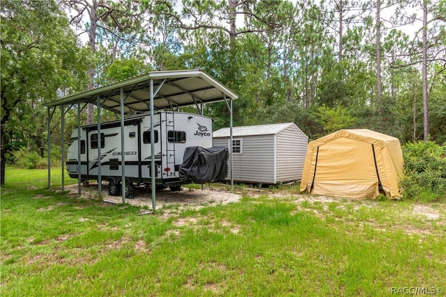 exterior space featuring a shed and a carport