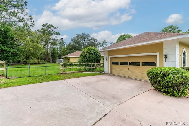 view of property exterior featuring a yard