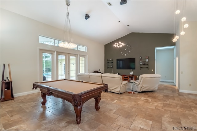 recreation room with french doors, high vaulted ceiling, a notable chandelier, and pool table