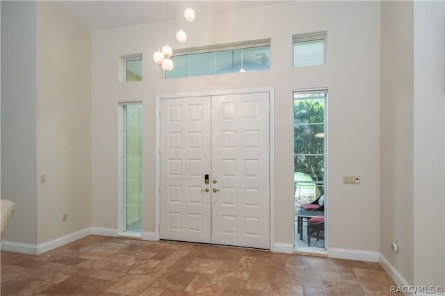 entrance foyer with a towering ceiling