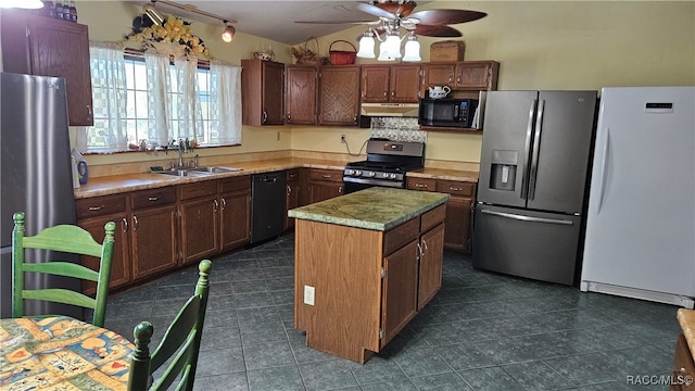 kitchen with ceiling fan, sink, ventilation hood, a kitchen island, and black appliances