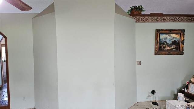 bathroom with tiled shower / bath combo, tile walls, and toilet