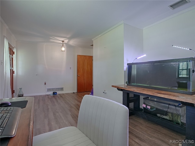 office featuring wood-type flooring and ornamental molding