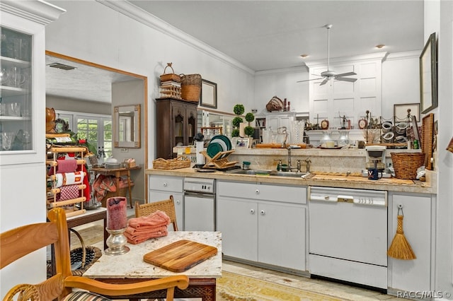 kitchen featuring white cabinets, ornamental molding, ceiling fan, sink, and dishwasher