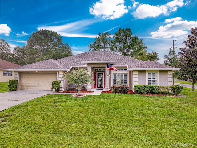 ranch-style house with a garage and a front yard