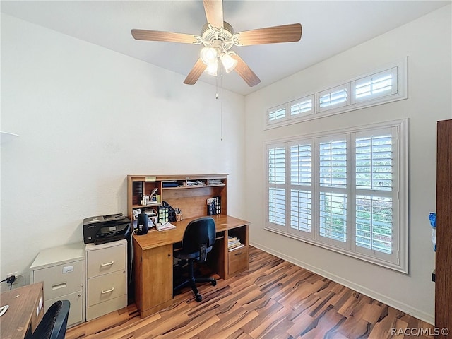 office featuring ceiling fan and wood-type flooring