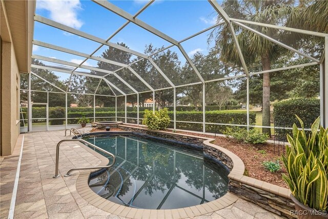 1789 N Sky Glen Path, Hernando, FL 34442 - outdoor pool featuring a lanai, a patio, and a jacuzzi