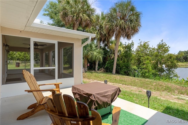 4306 E Gloria Dr, Hernando, FL 34442 - view of patio / terrace featuring a sunroom and a ceiling fan