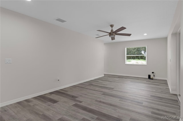 4306 E Gloria Dr, Hernando, FL 34442 - unfurnished room with a ceiling fan, wood finished floors, and recessed lighting