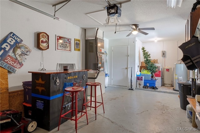4306 E Gloria Dr, Hernando, FL 34442 - garage with a ceiling fan, a garage door opener, and water heater