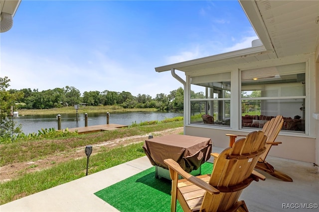 4306 E Gloria Dr, Hernando, FL 34442 - view of patio / terrace featuring a water view and a dock