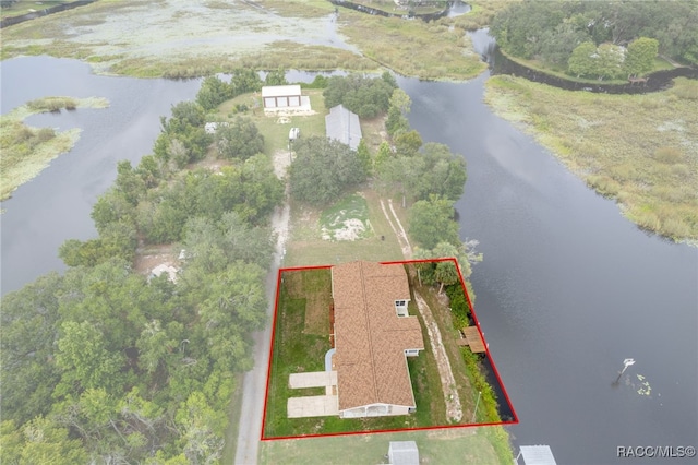 4306 E Gloria Dr, Hernando, FL 34442 - aerial view of property and surrounding area featuring a nearby body of water and property parcel outlined