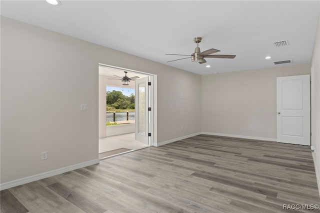 4306 E Gloria Dr, Hernando, FL 34442 - spare room featuring ceiling fan, wood finished floors, and recessed lighting