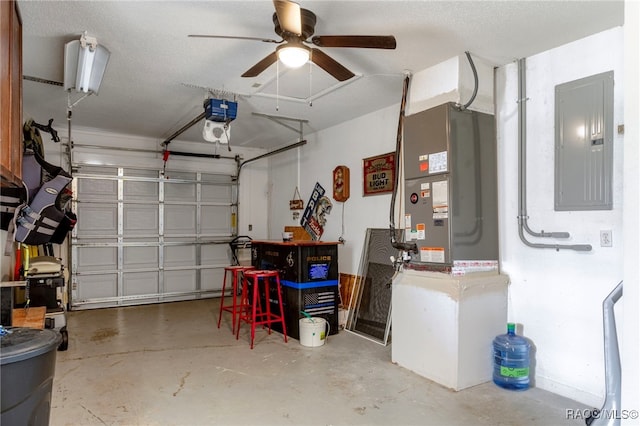 4306 E Gloria Dr, Hernando, FL 34442 - garage with electric panel, a ceiling fan, and heating unit