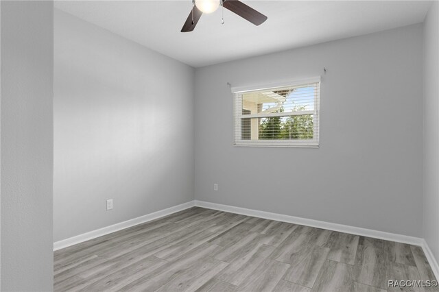4306 E Gloria Dr, Hernando, FL 34442 - unfurnished room featuring light wood-style floors and ceiling fan