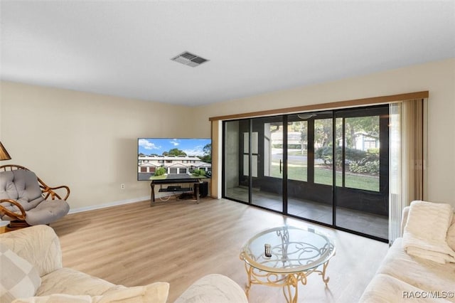 living room featuring light wood-type flooring