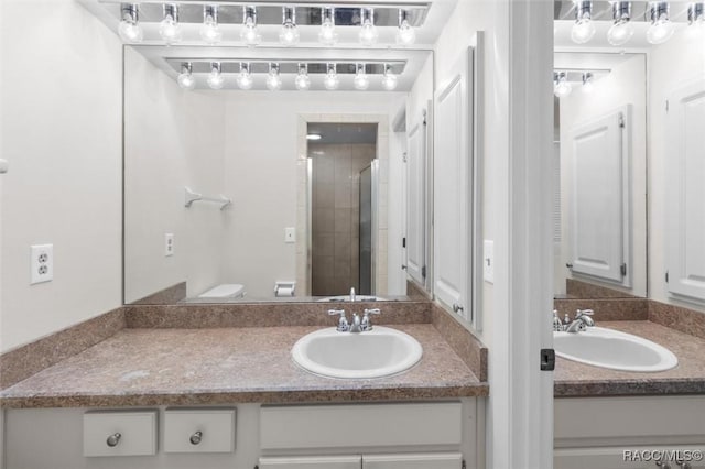 bathroom with vanity and walk in shower