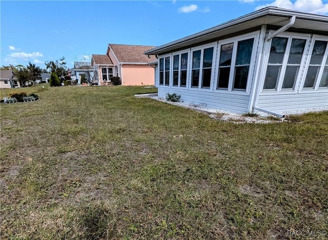 10482 S Clint Loop, Floral City, FL 34436 - view of side of property with a lawn