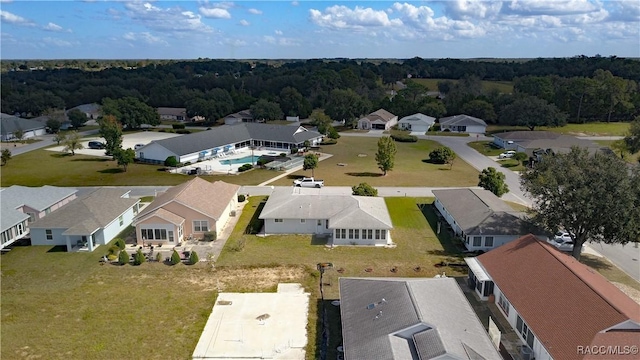 10482 S Clint Loop, Floral City, FL 34436 - aerial view of residential area featuring a pool area and a forest