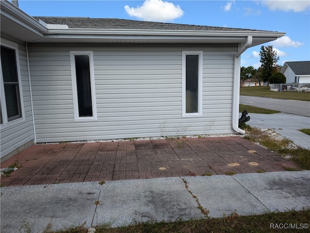 view of home's exterior with a patio area