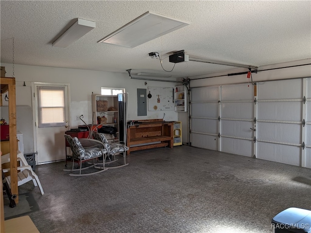 garage with electric panel and a garage door opener