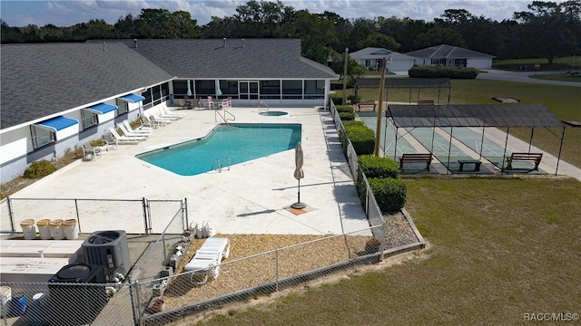 view of pool featuring central air condition unit, a yard, and a patio