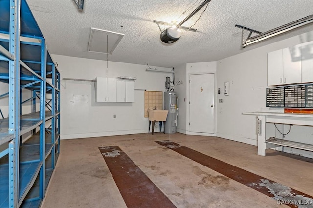 garage with water heater and a garage door opener