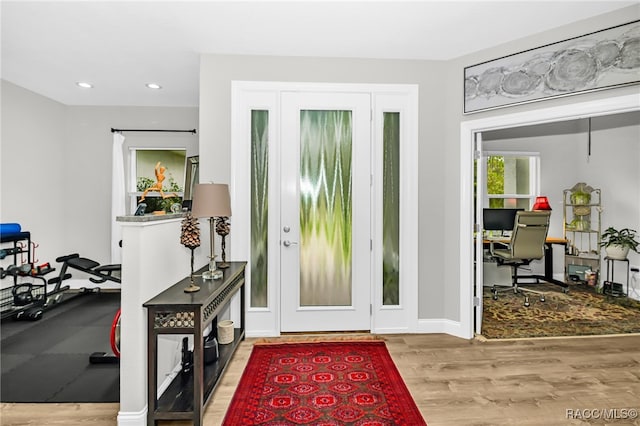 entryway with light hardwood / wood-style flooring