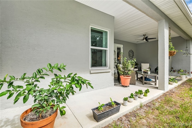 view of patio with ceiling fan