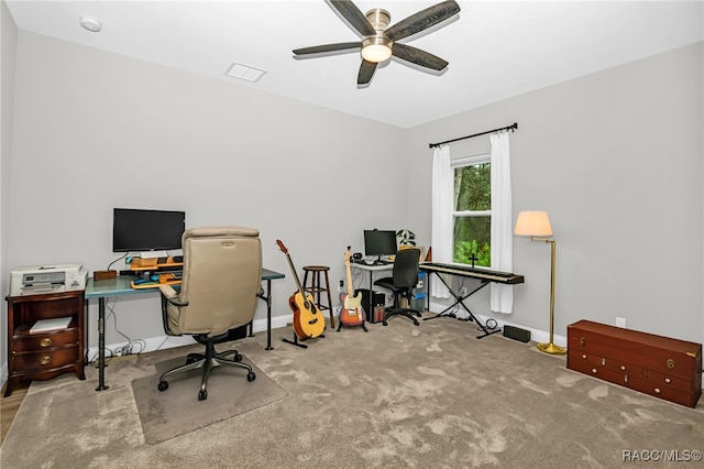 office space with ceiling fan and light colored carpet