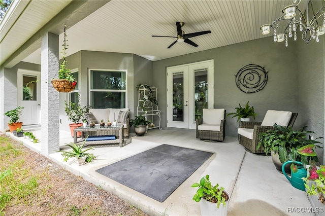 view of patio with outdoor lounge area, ceiling fan, and french doors