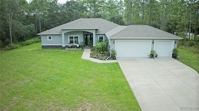 ranch-style home featuring a front yard and a garage