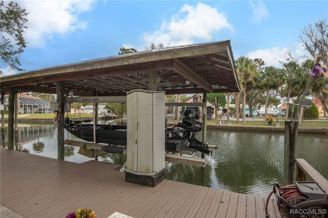 view of dock with a water view